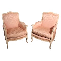 Vintage Pair of French Louis XV Crème Painted Bergère Lounge Chairs with Pink Damask