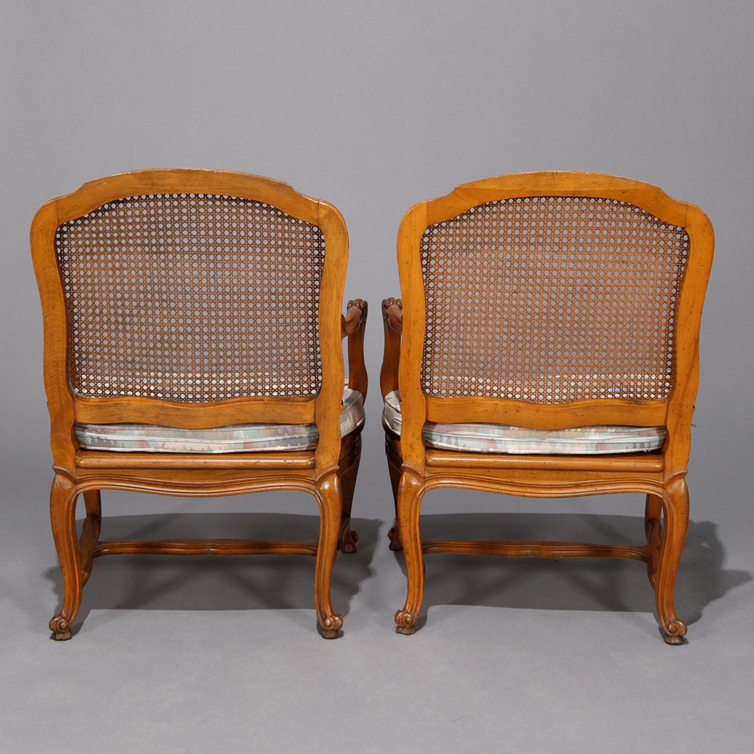 Pair of French Louis XV Fruitwood Pressed Cane Arm Chairs, 19th Century 1