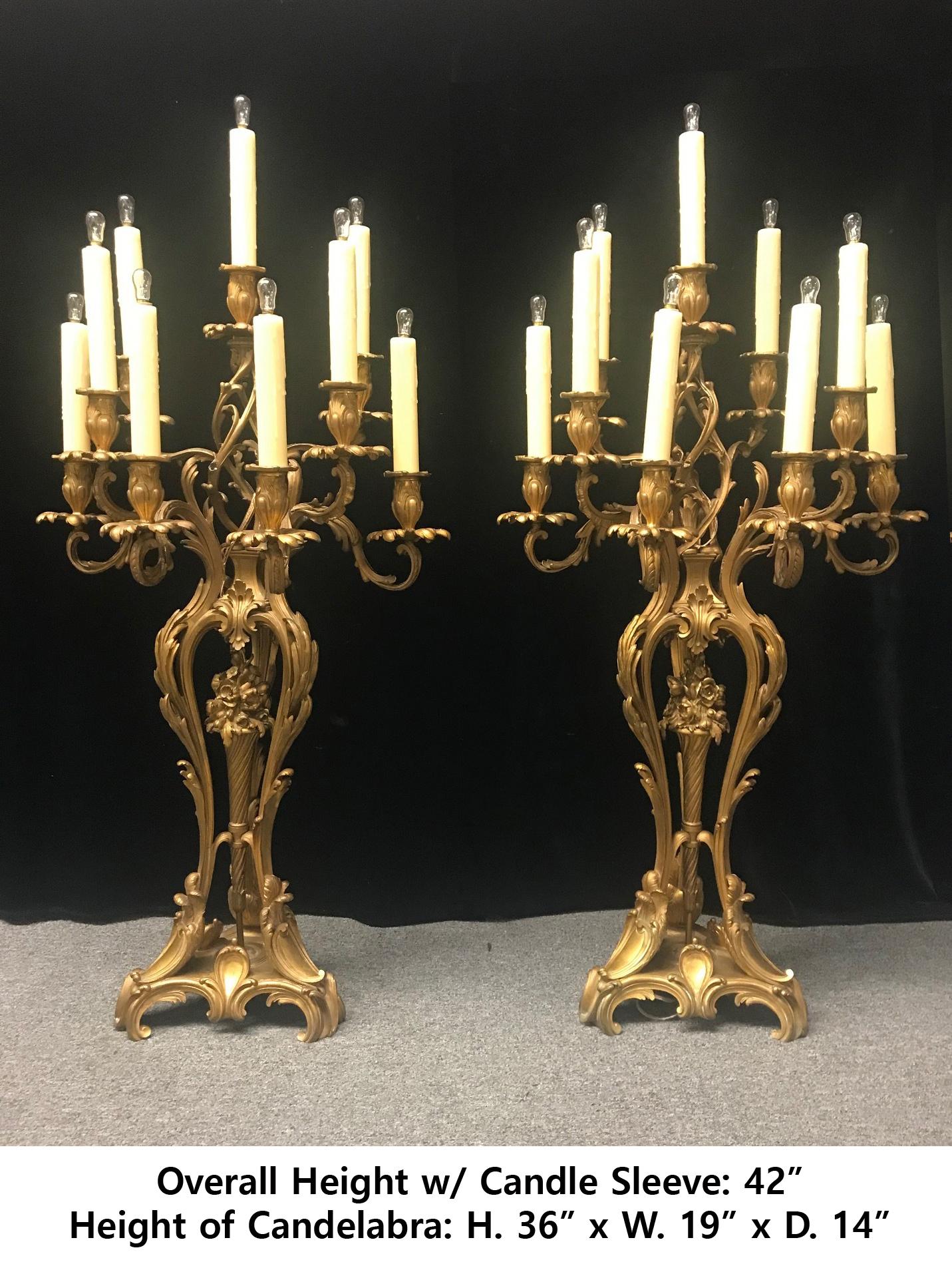 Monumental and exquisite French pair of Ormolu 9 light candelabra, late 19th century.
Ornately designed with acanthus leaf and scrolls with fine foliate scroll decoration. 
Meticulous attention has been given to every detail.
with hand made