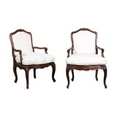 Pair of French Louis XV Style 1820s Walnut Fauteuils with New Upholstery