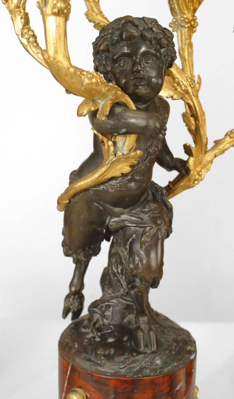 Pair of French Louis XV Style Bronze with Cupid 5 Arm Candelabra on Marble Bases For Sale 1