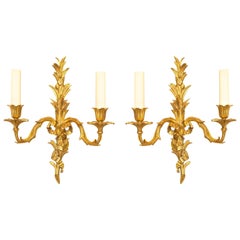 Pair of French Louis XV Style 20th Century Gilt Bronze Two-Arm Wall Sconces