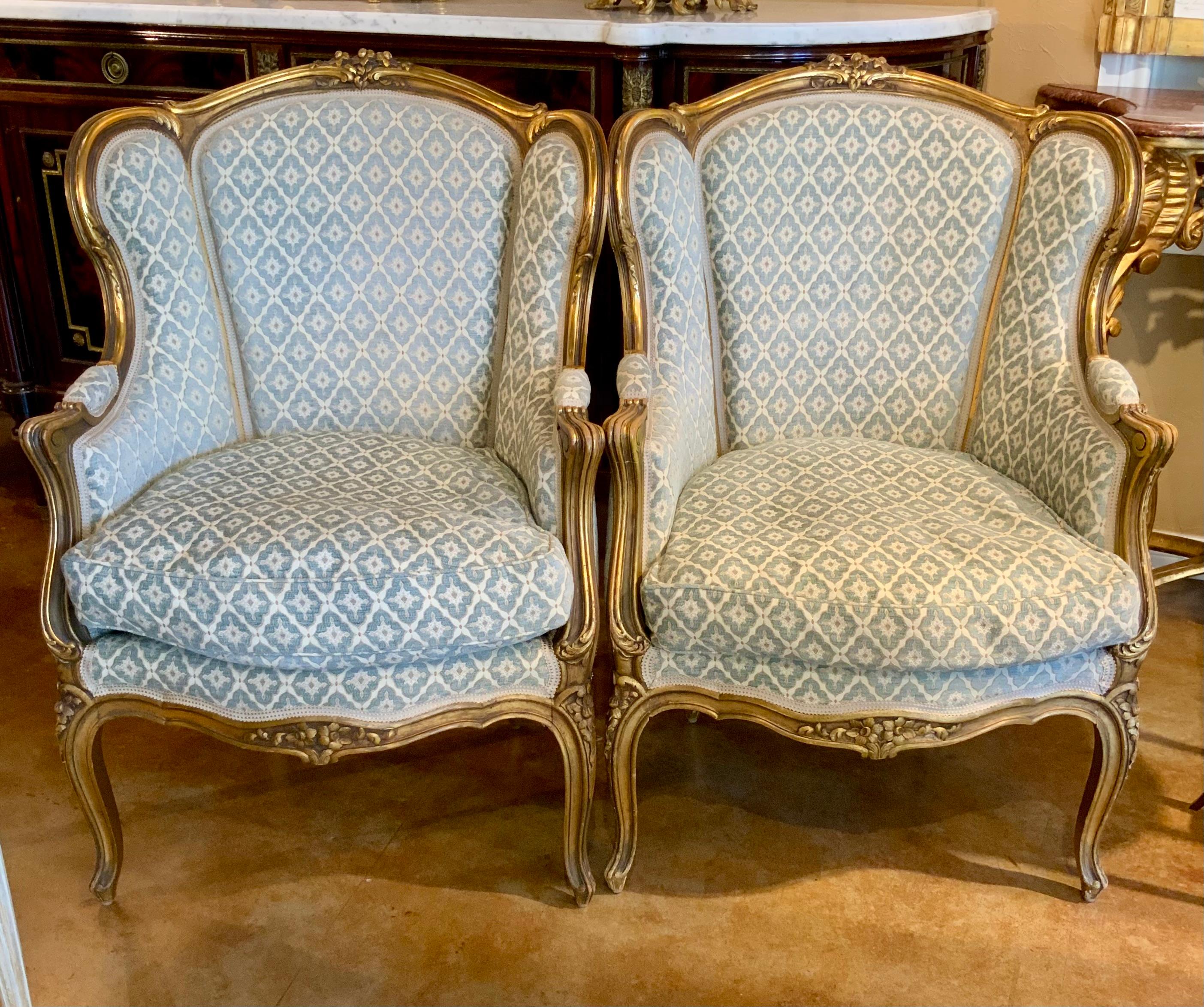 Hand-Carved Pair of French Louis XV—Style antique giltwood bergere chairs For Sale