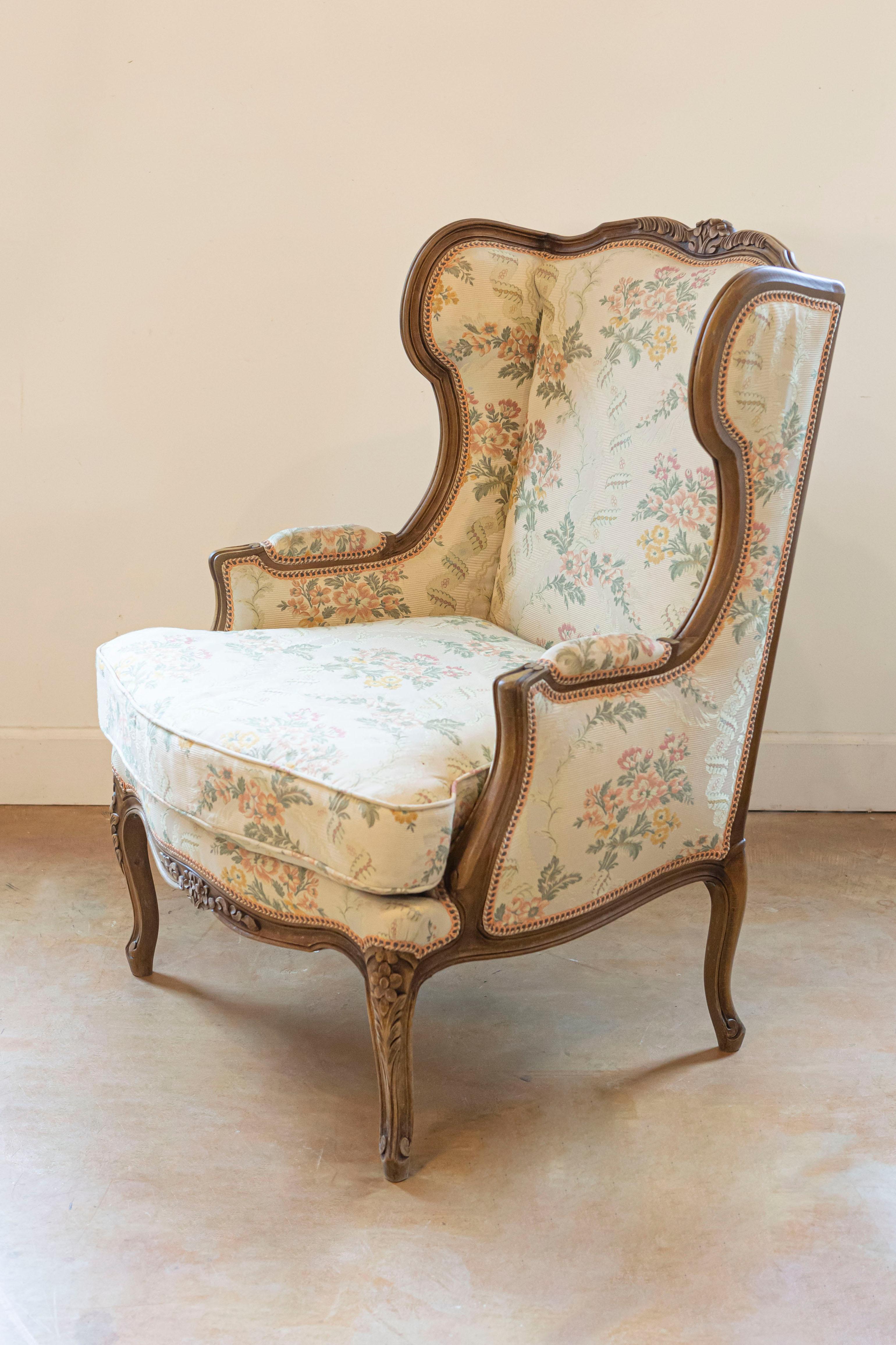 20th Century Pair of French Louis XV Style Bergères À Oreilles with Carved Floral Décor For Sale