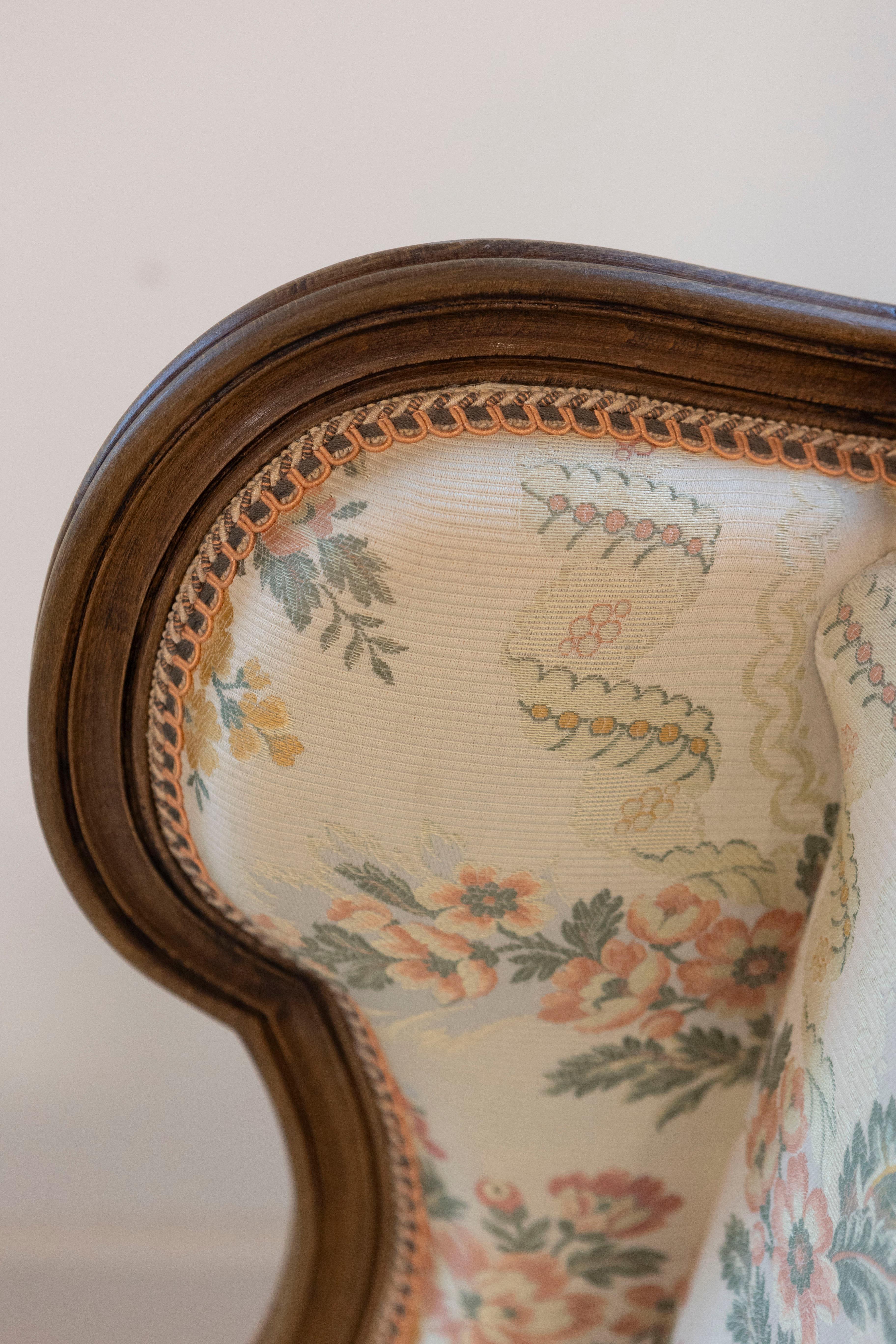 Pair of French Louis XV Style Bergères À Oreilles with Carved Floral Décor For Sale 1