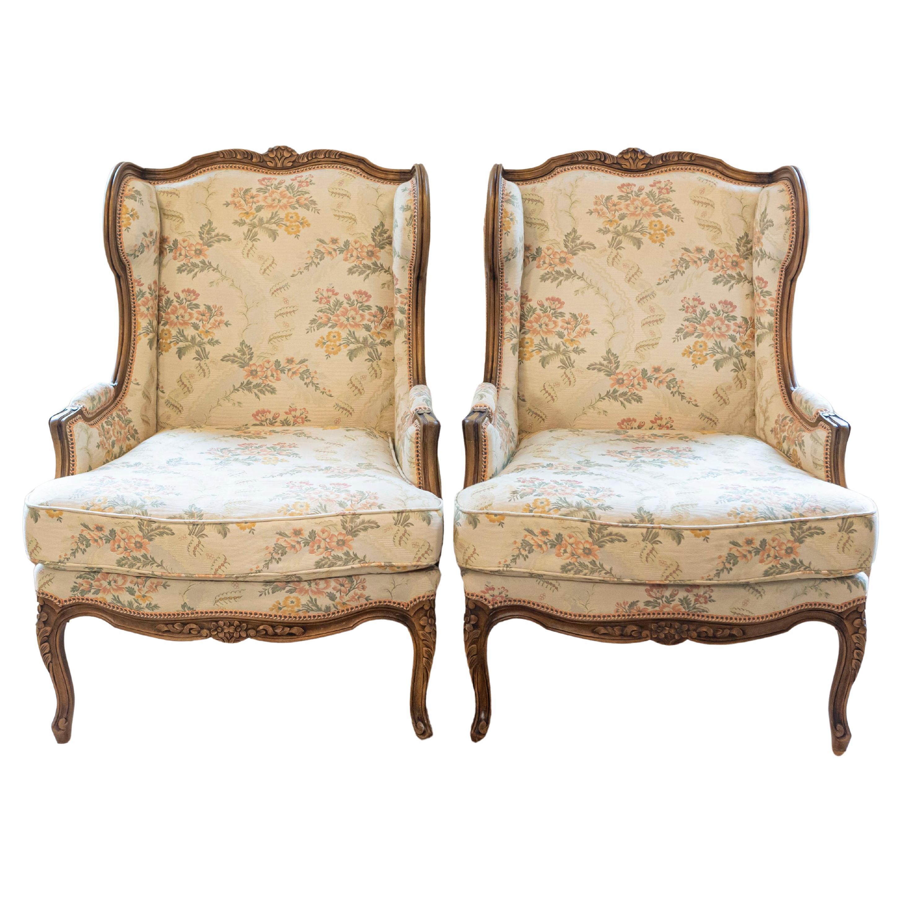 Pair of French Louis XV Style Bergères À Oreilles with Carved Floral Décor
