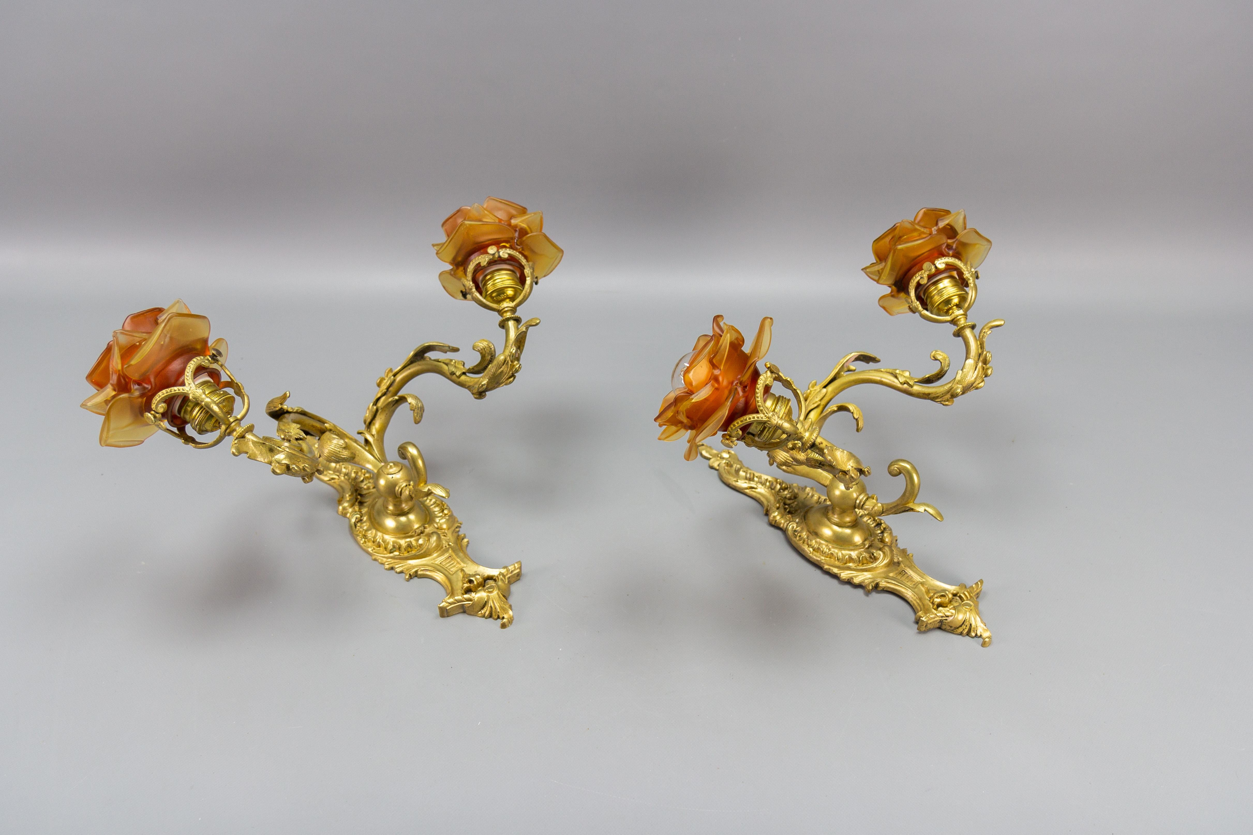 Pair of French Louis XV Style Bronze and Brown Glass Twin Arm Sconces, ca 1900 For Sale 4