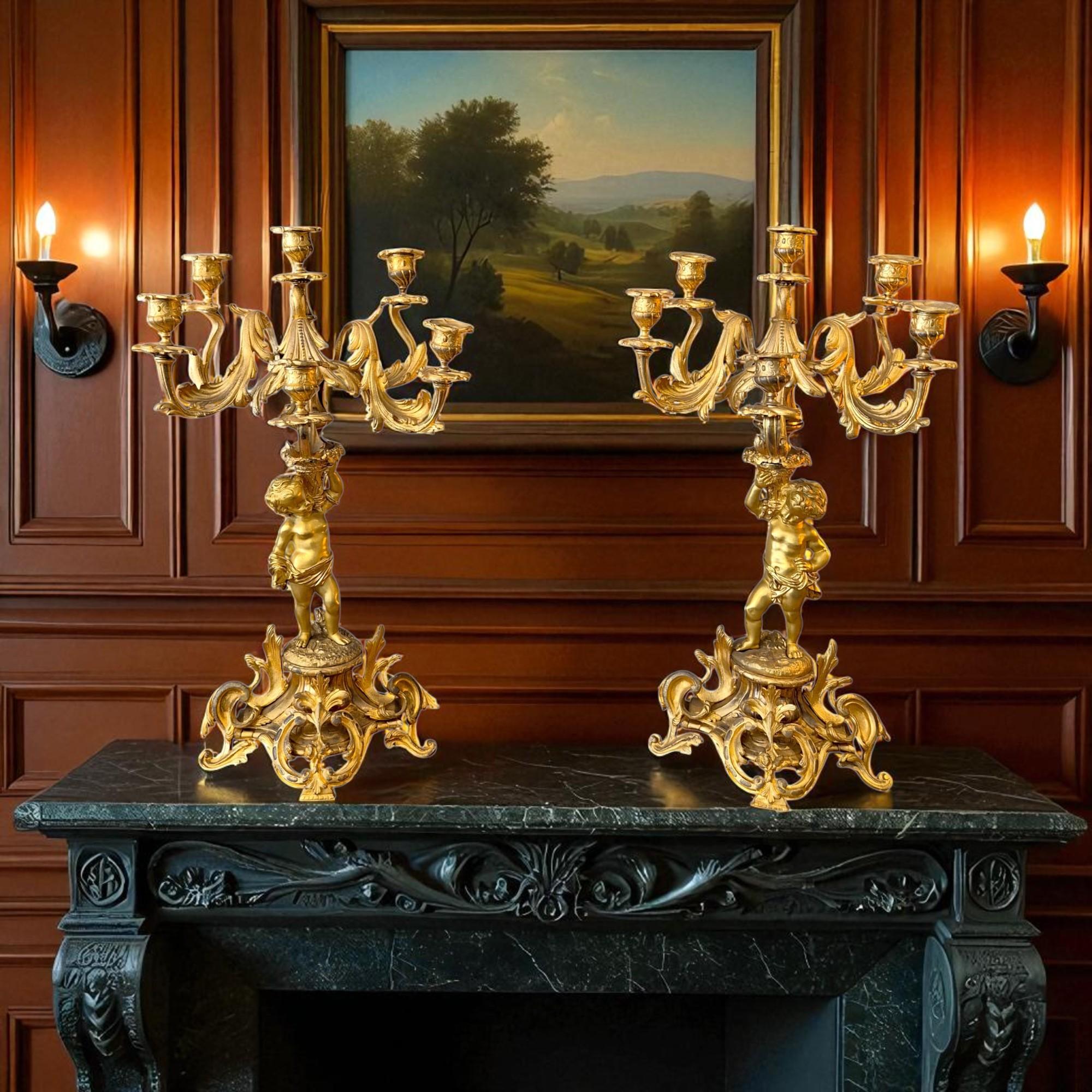 Elegant and sumptuous, this 19th-century pair of candelabras perfectly embodies the refinement of French decorative arts. Crafted in finely chased gilt bronze, these seven-light candelabras stand out for their ornamental richness and exquisite