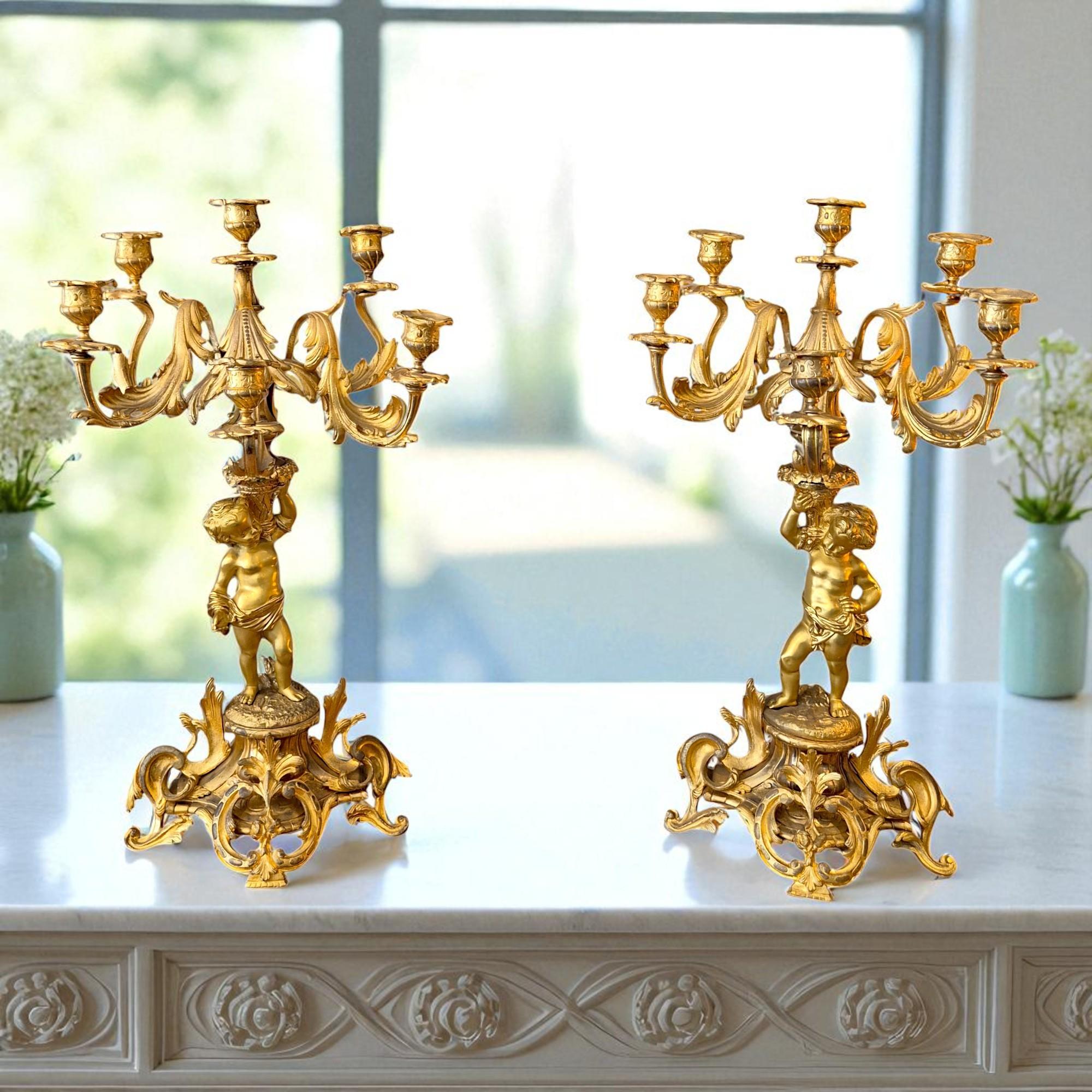 Gilt Pair of French Louis XV Style Bronze Dore Cupid Candelabras, 19th Century For Sale