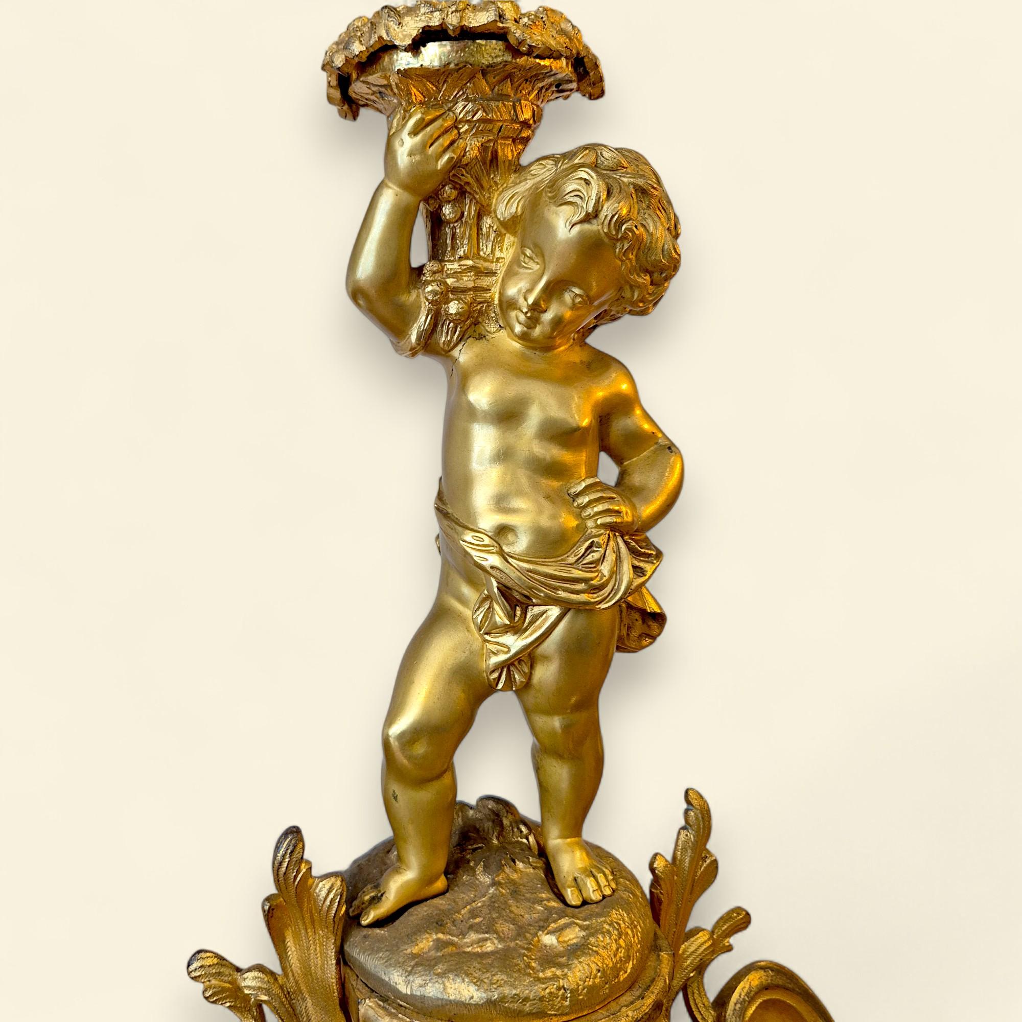 Pair of French Louis XV Style Bronze Dore Cupid Candelabras, 19th Century In Good Condition For Sale In NICE, FR