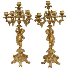 Pair of French Louis XV Style Bronze Dore Cupid Candelabras