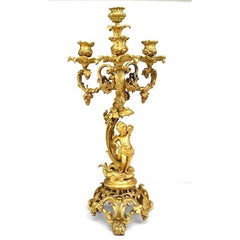 Pair of French Louis XV Style Bronze Dore Four Arm Cupid Candelabras