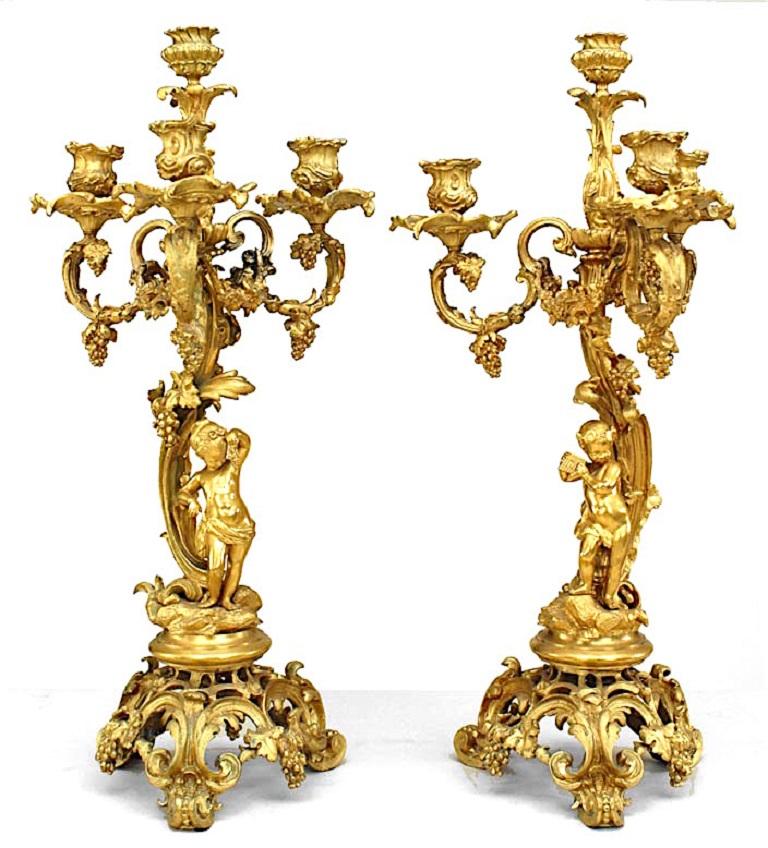 19th Century Pair of French Louis XV Style Bronze Dore Four Arm Cupid Candelabras For Sale