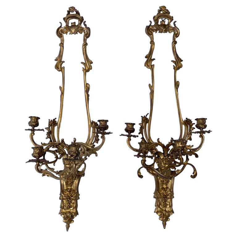 Pair of French Louis XV Style Bronze Four Light Sconces For Sale