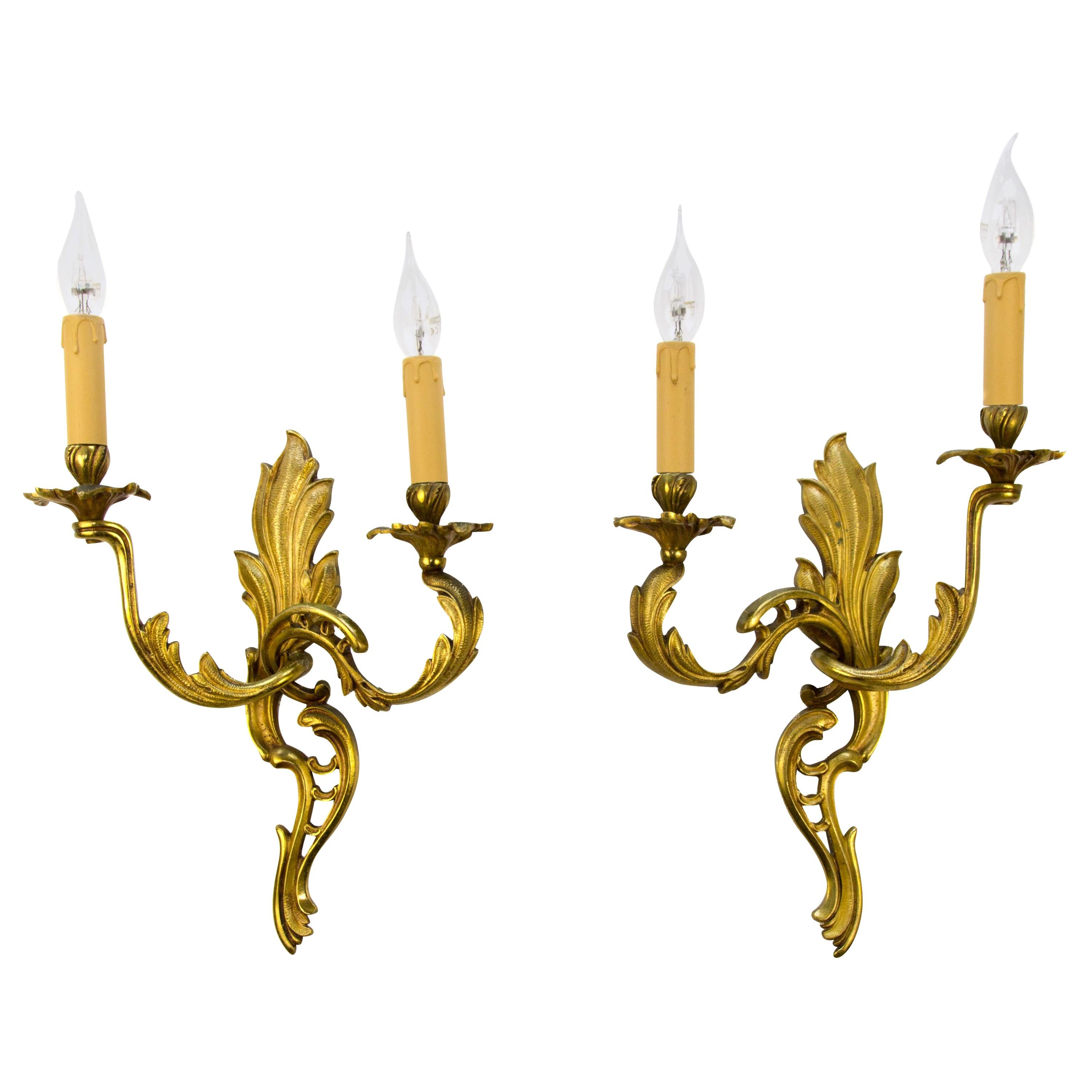 Pair of French Louis XV Style Two-Light Bronze Sconces