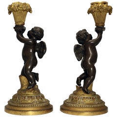 Antique Pair of French Louis XV Style Candlesticks, Modelled as Cherubs with Baskets