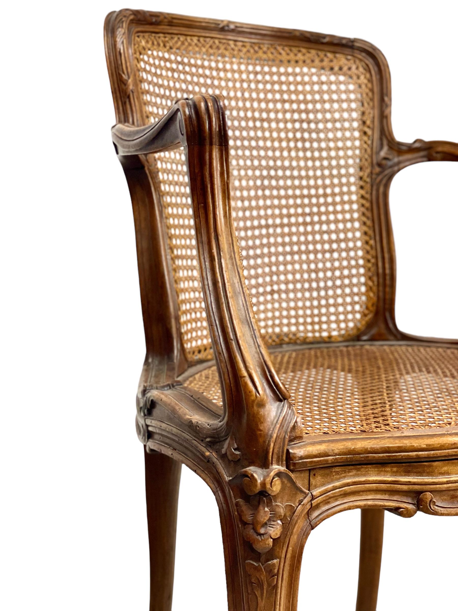 Carved Pair of French Louis XV Style Caned Armchairs