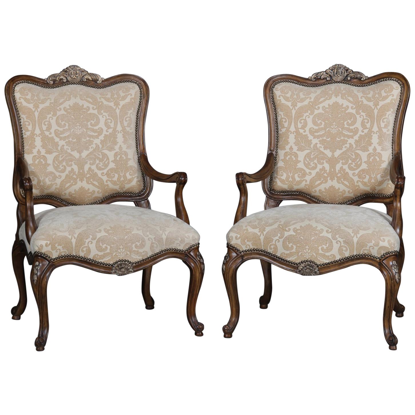 Pair of French Louis XV Style Carved and Gilt Mahogany Fauteuil Chairs
