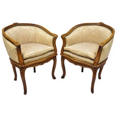 Pair of French Louis XV Style Carved Walnut Barrel Back Boudoir Chairs