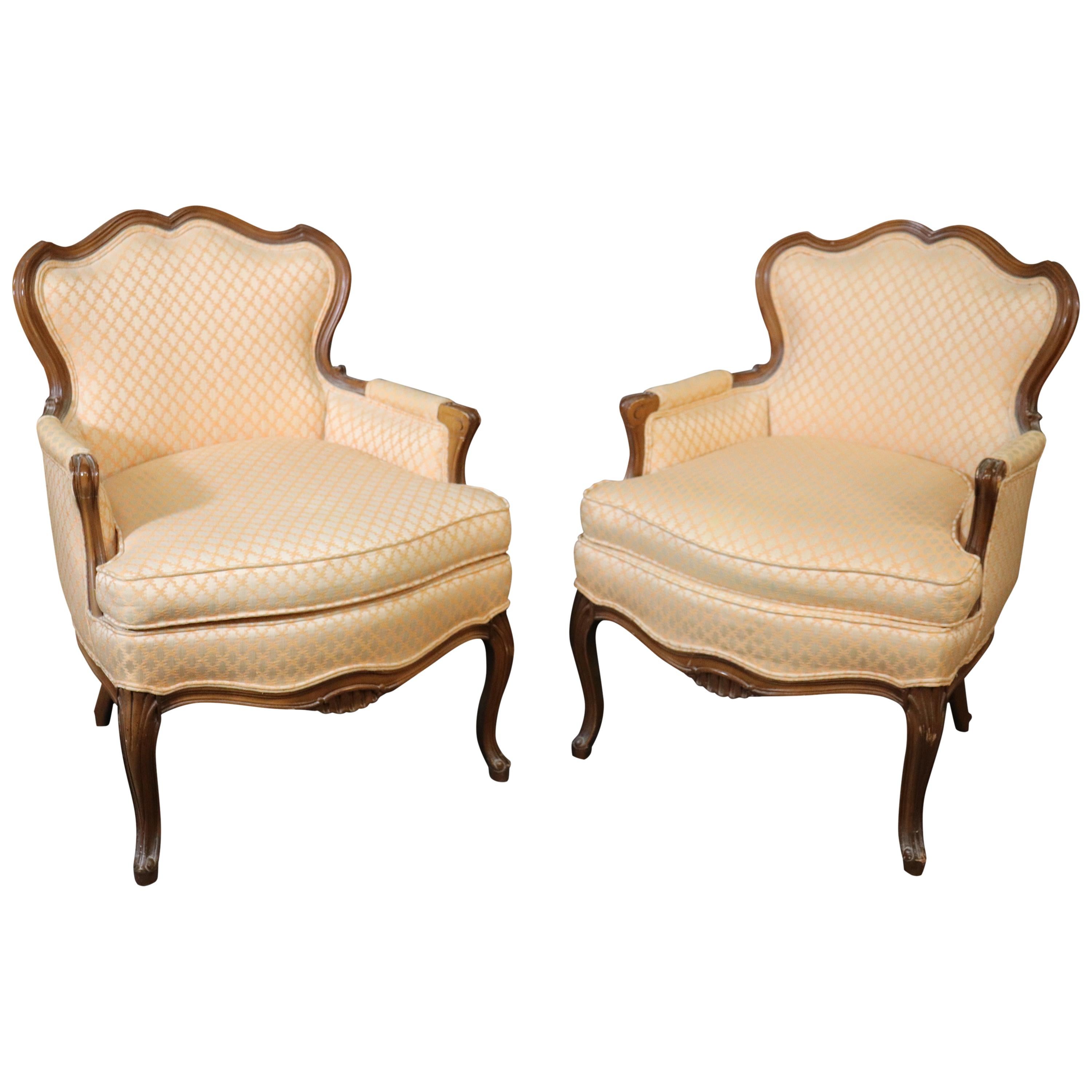 Pair of French Louis XV Style Carved Walnut Bergère Club Chairs, circa 1950