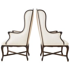 Pair of French Louis XV Style Carved Wing Chairs