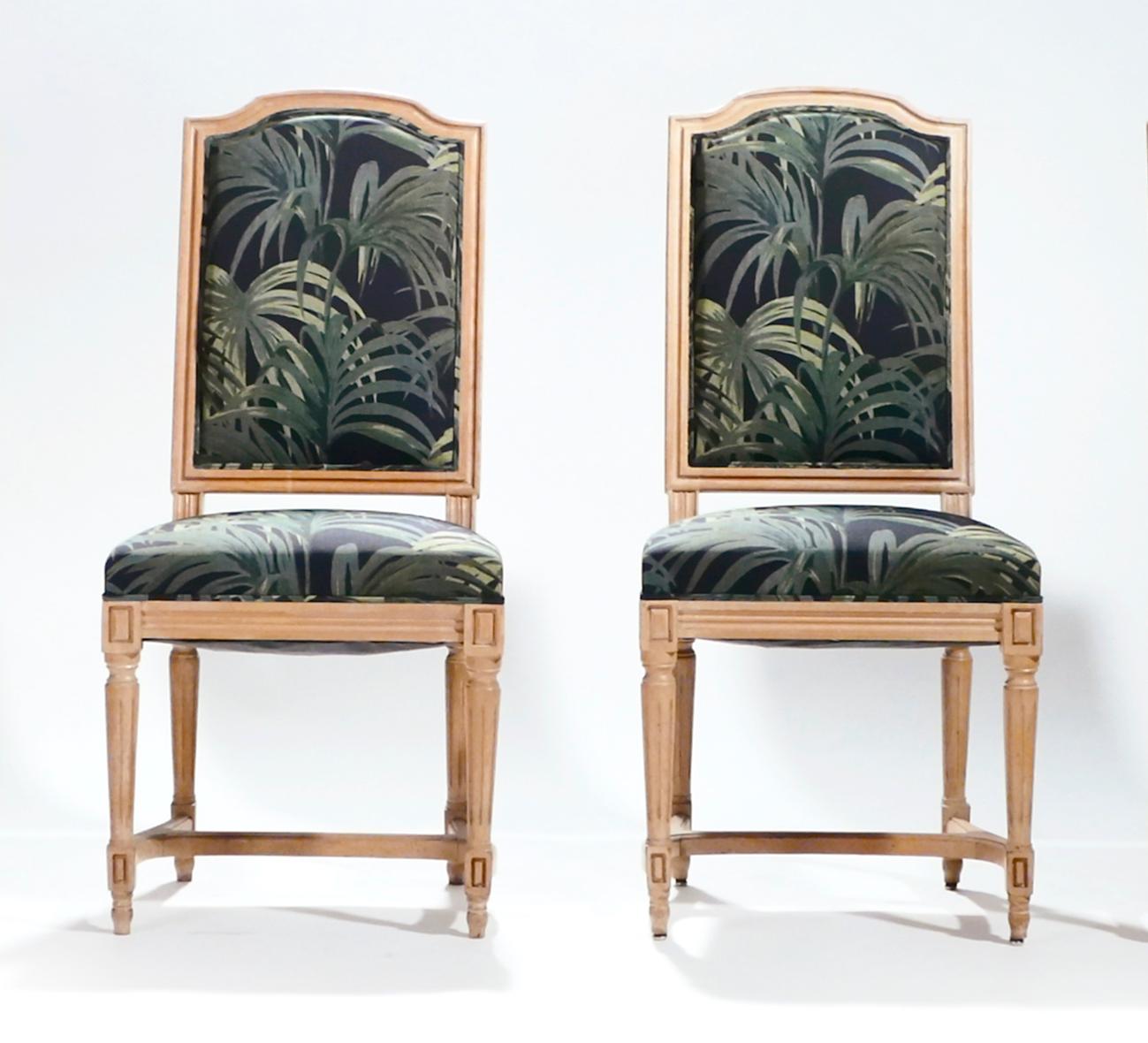 New colorful upholstery is a great contrast to the beautiful old oak in these chairs. The lovely patina evident on the oak feet and structure is enough to convey the half-century of history in this pair of chairs, so the upholstery, in a fresh palm