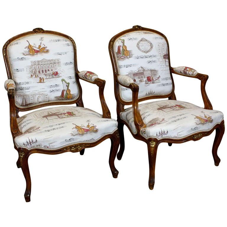 Pair of French Louis XV Style Fauteuils with Mozart and Music Themed Toile For Sale