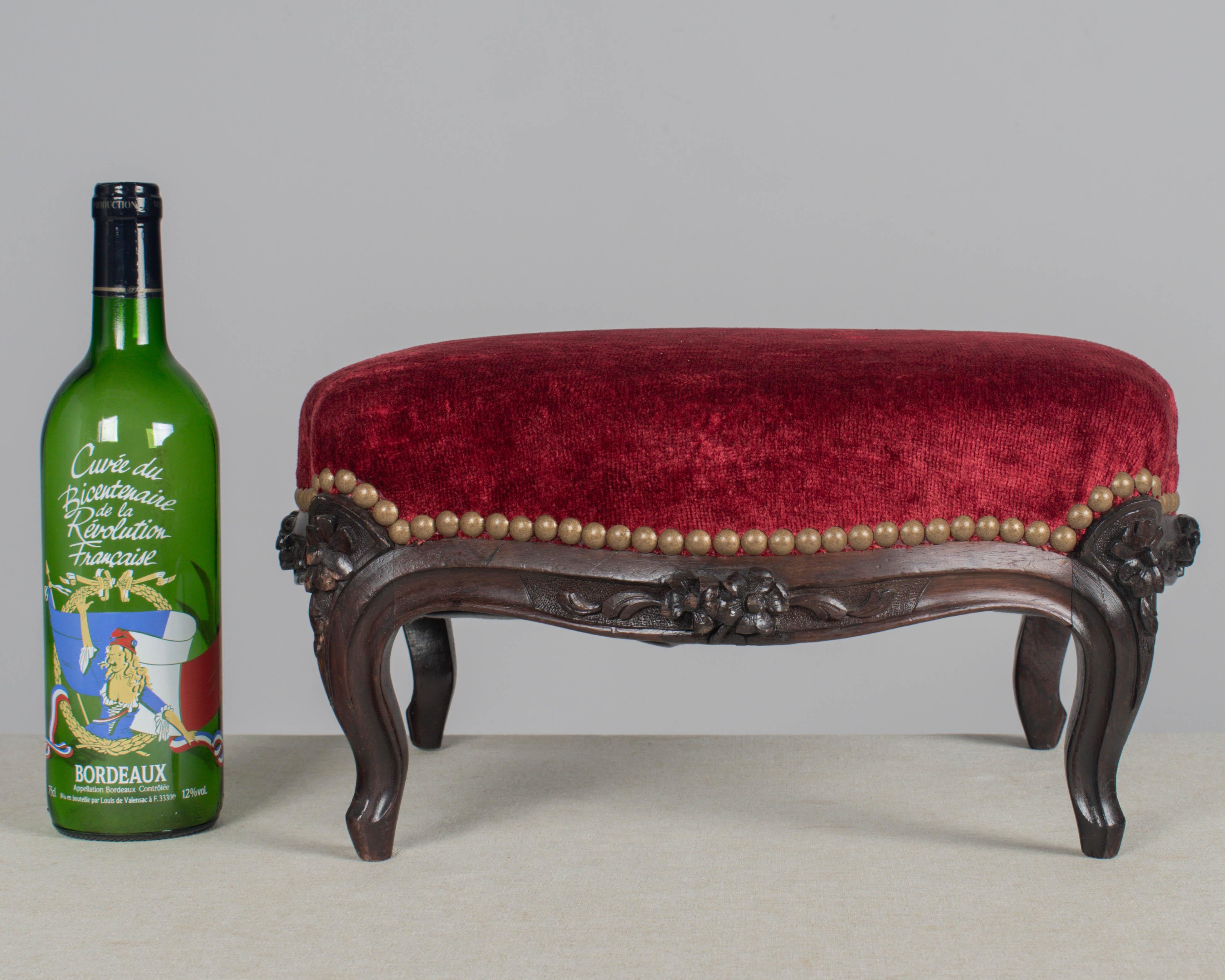 Hand-Carved Pair of French Louis XV Style Foot Stools