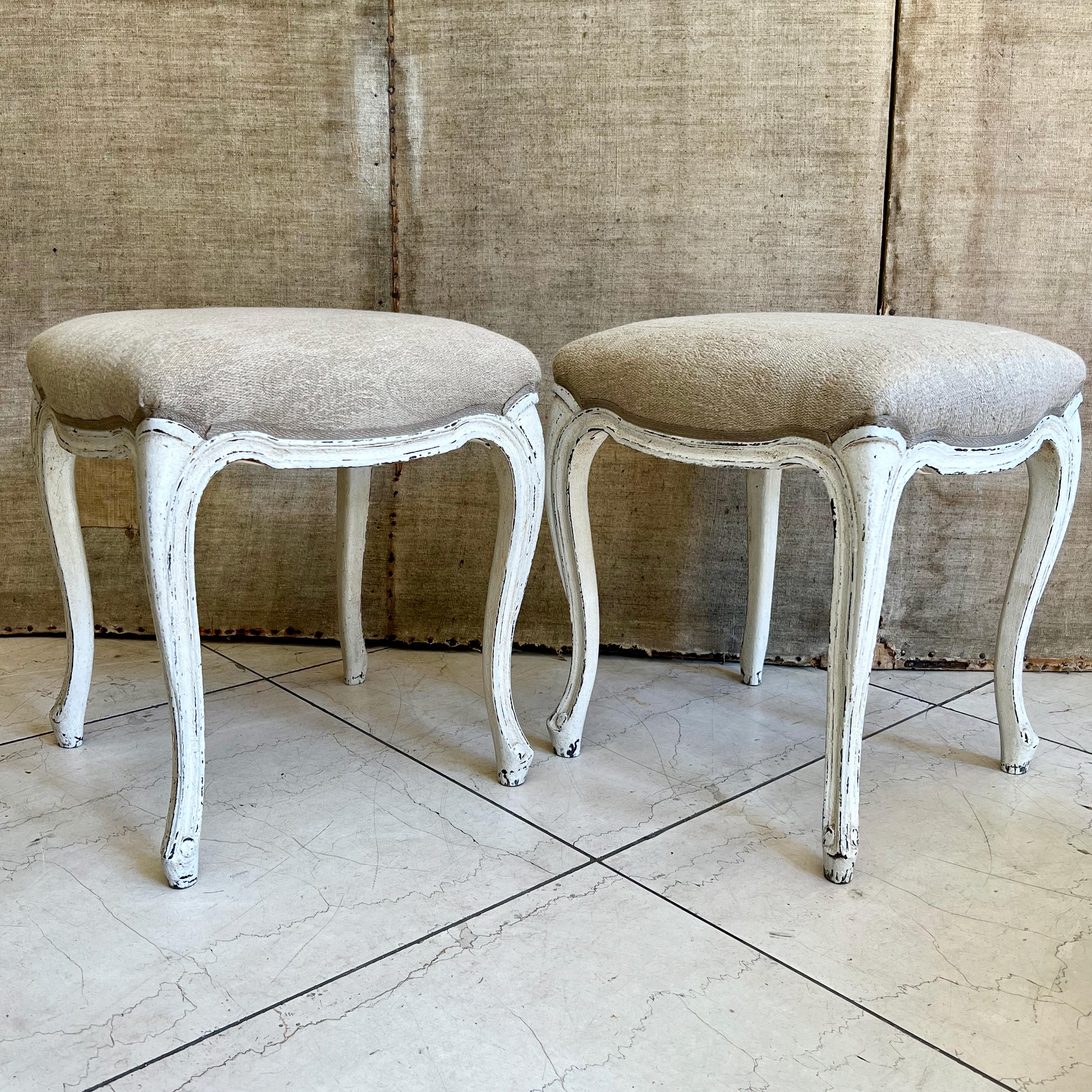 A pair of painted French tabourets / footstools in Louis XV style with scalloped frieze, raised on slender cabriole legs. Upholstered in textured fabric with Classic gimp trim,
France, circa 1900's.
Here are few examples … surprising pieces and