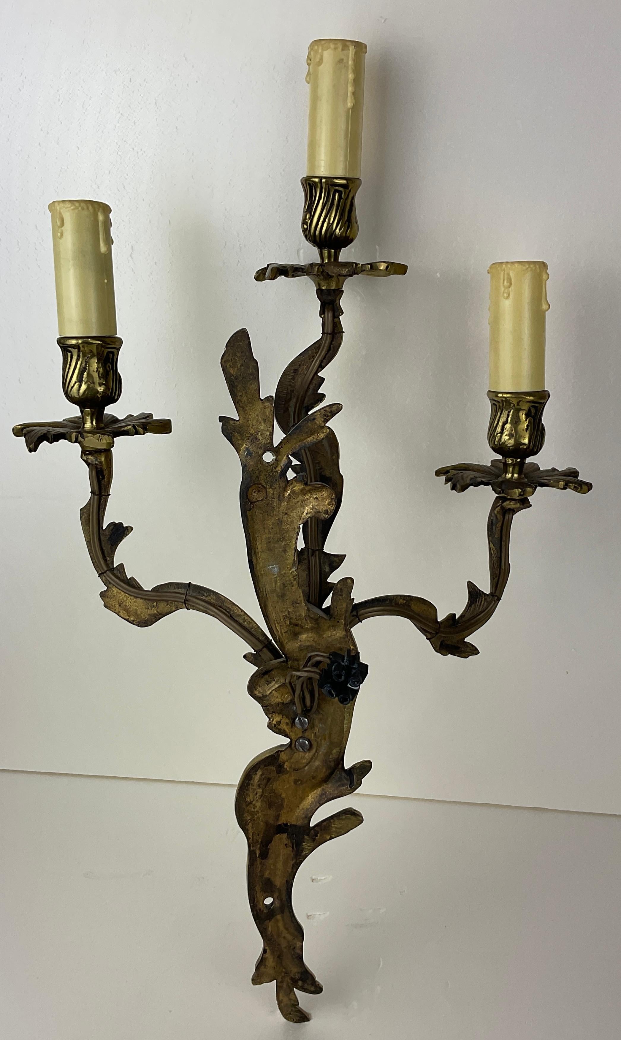 Pair of French Louis XV Style Gilt Bronze Three-Armed Sconces For Sale 4