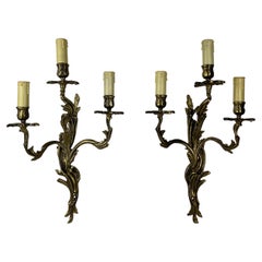 Pair of French Louis XV Style Gilt Bronze Three-Armed Sconces