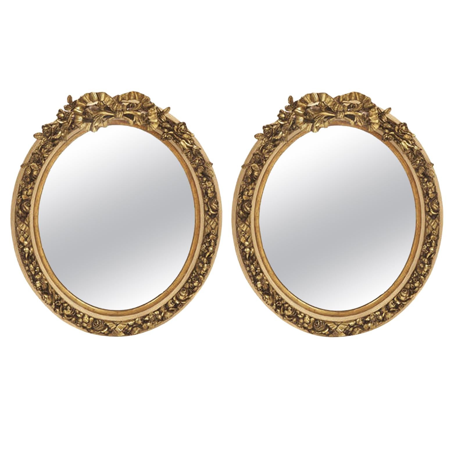 Pair of French Louis XV Style Gilt Oval Mirrors