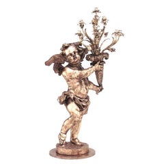 Pair of French Louis XV Style Gilt Wood Cherub Floor Torchieres