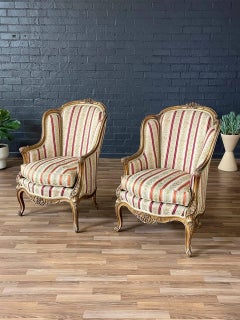 Pair of French Louis XV Style Giltwood Bergère Armchairs