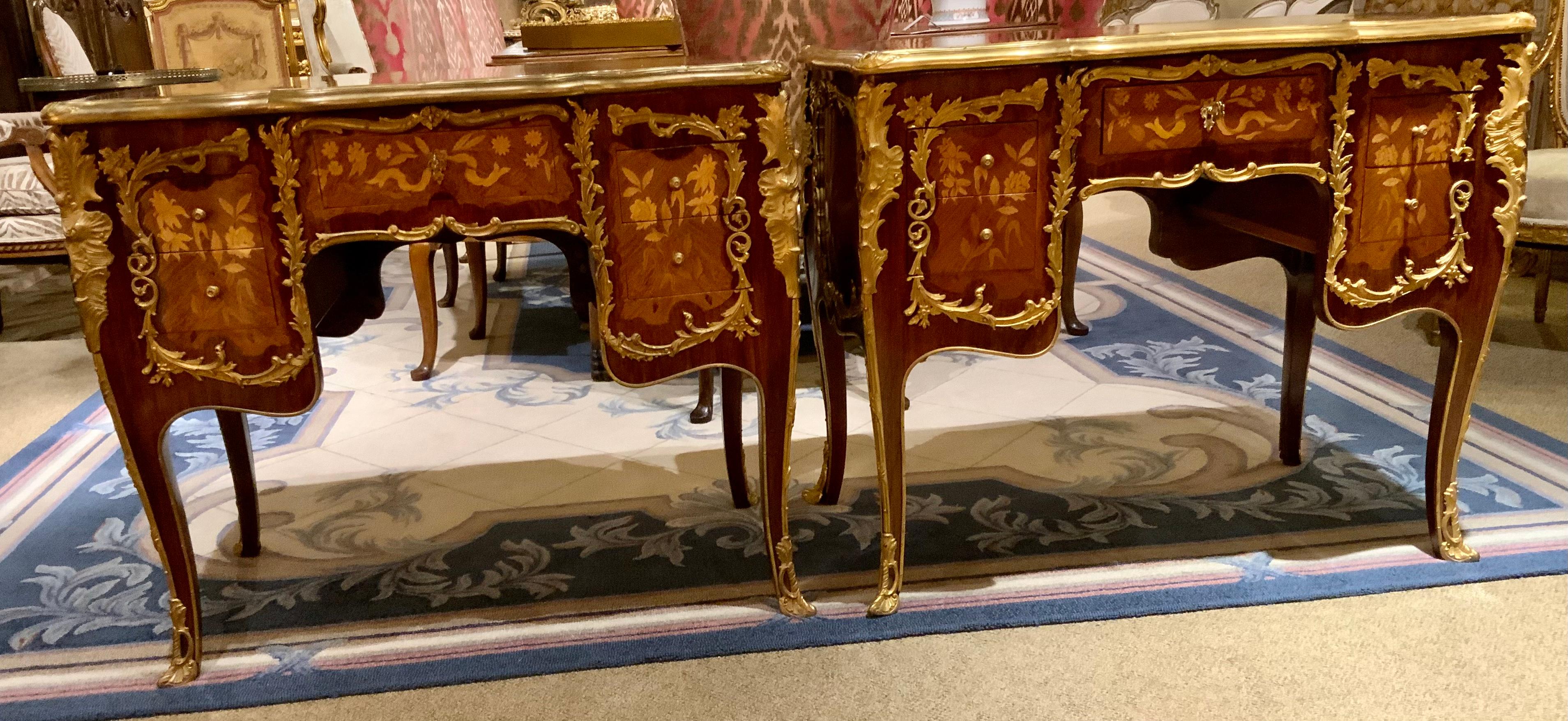 The expert cabinetry makes this pair special. The marquetry inlay is
Superb in quality. The bronze dore mounts are well cast and the brilliant 
Hue of the gold is excellent. The legs are gently curved in the Louis XV
Style. Foliate and floral
