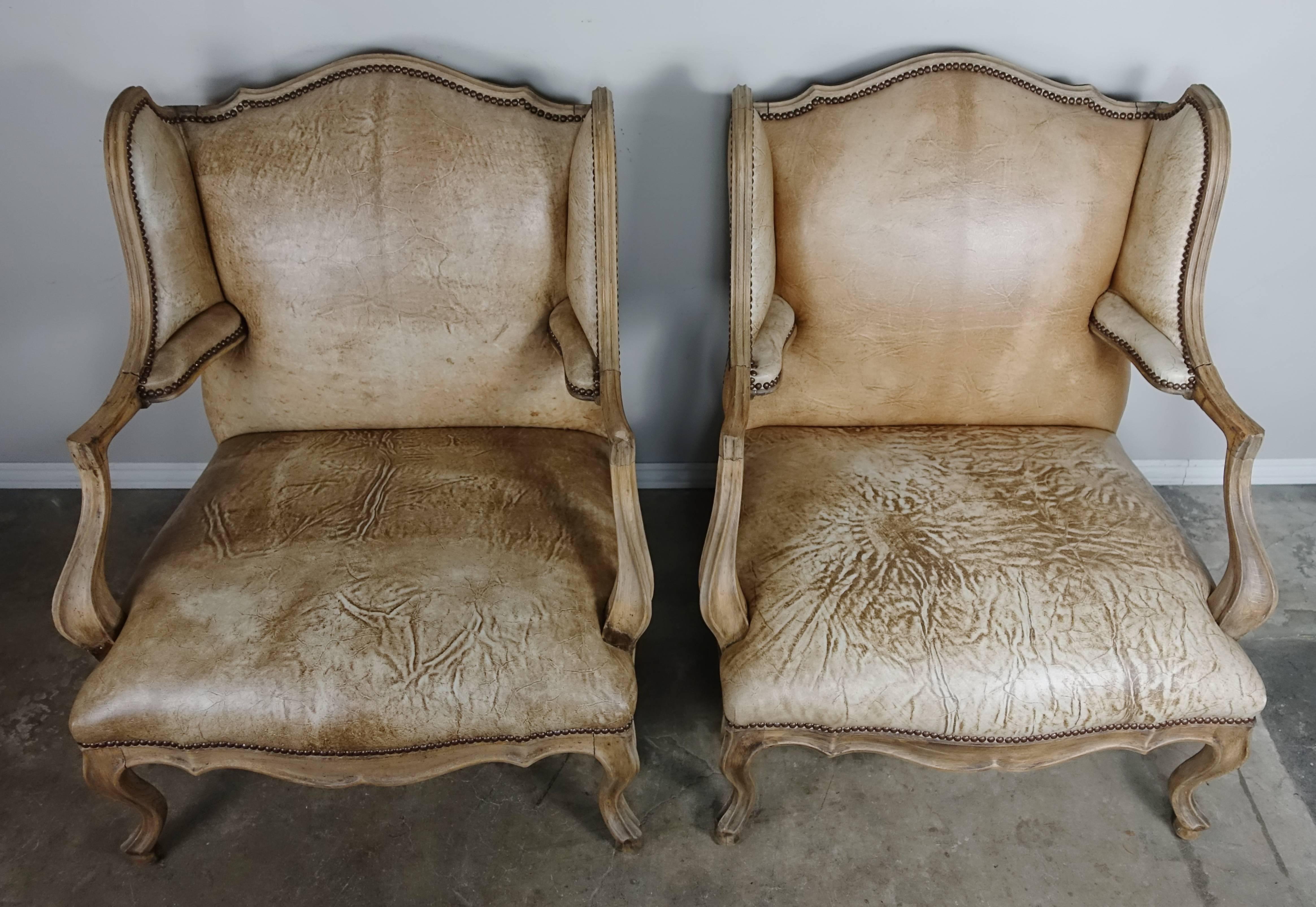 Pair of French Louis XV Style Leather Armchairs In Distressed Condition In Los Angeles, CA