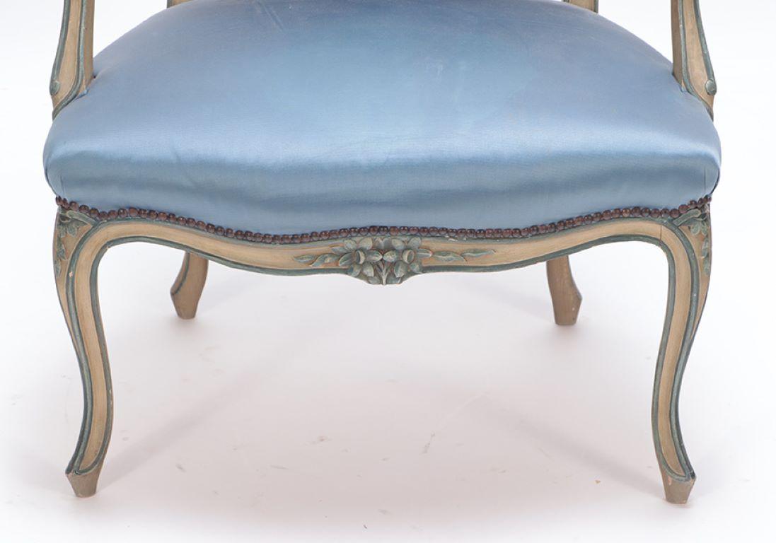 Upholstery Pair of French Louis XV style open armchairs having carved frames circa 1920. For Sale
