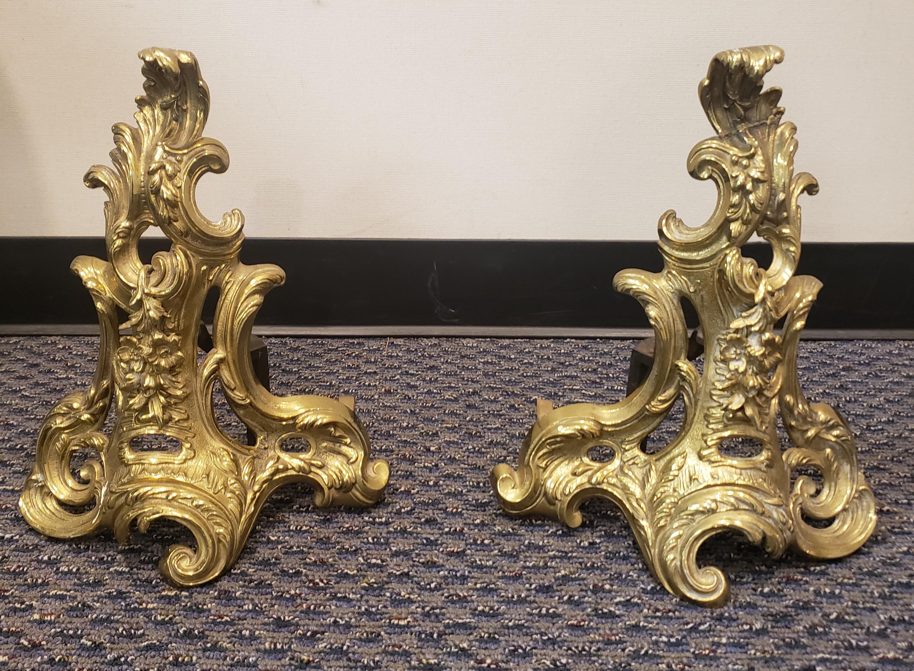 Stunning Pair of French Louis XV Style Ormolu Chenets, Each finely modeled in the form of acanthus leaf sprays.
