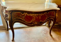 Pair of French Louis XV-Style ormolu mounted consoles with white marble