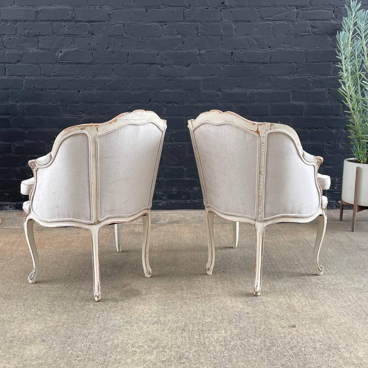 Wood Pair of French Louis XV style Painted and Parcel-Gilt Armchairs For Sale