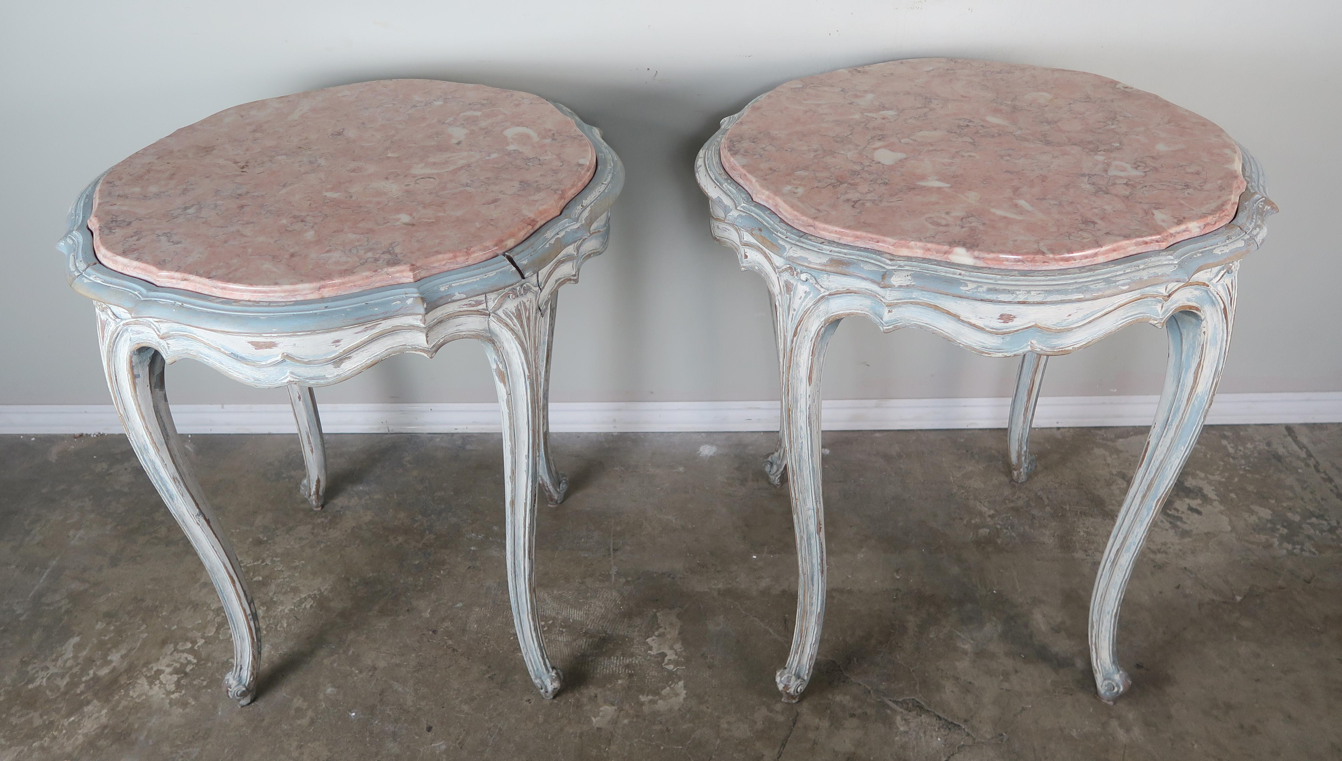 Pair of French cream and soft blue painted Louis XV style side table with inset marble tops.
 
