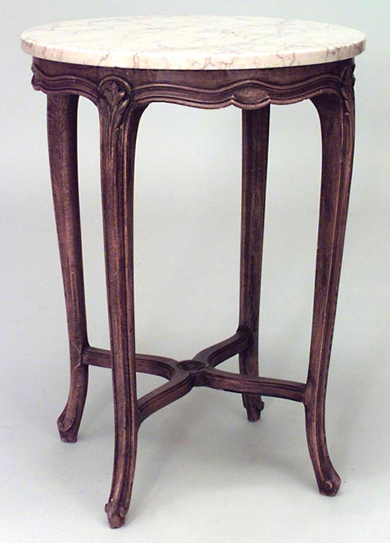 Pair of French Louis XV-style (20th Century) provincial small walnut end tables with stretcher and beige marble top.
