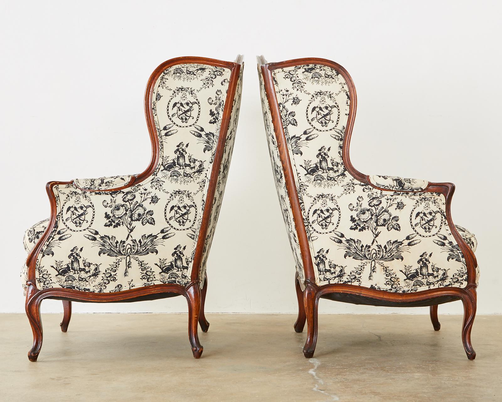 20th Century Pair of French Louis XV Style Toile Wingback Chairs