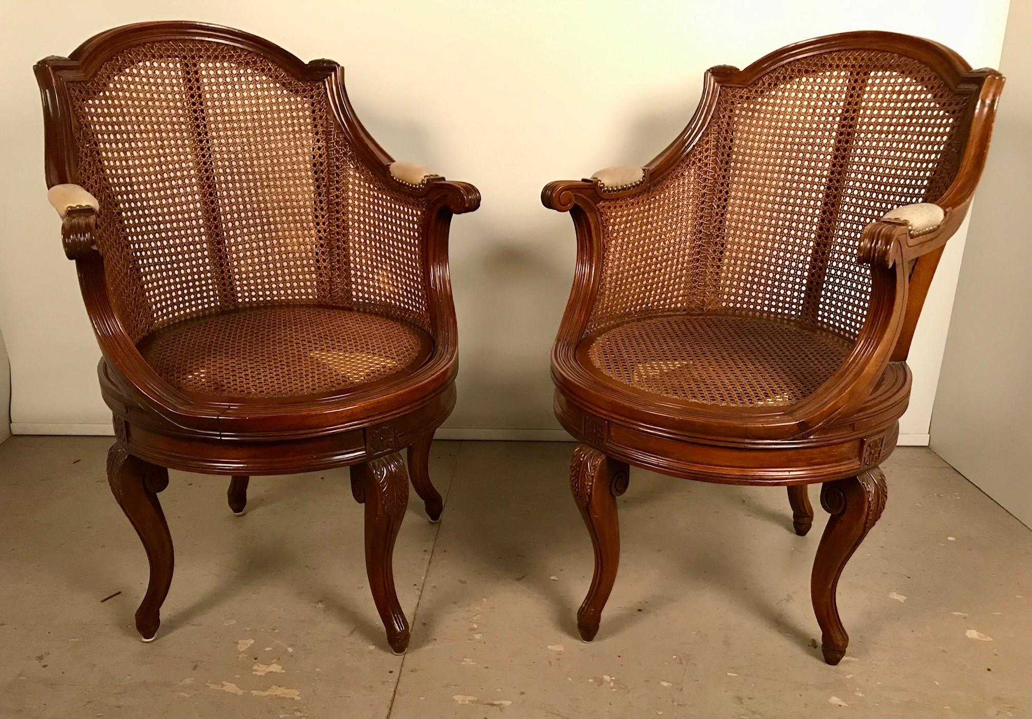 Caning Pair of French Louis XV Style Walnut & Caned Swivel Armchairs For Sale