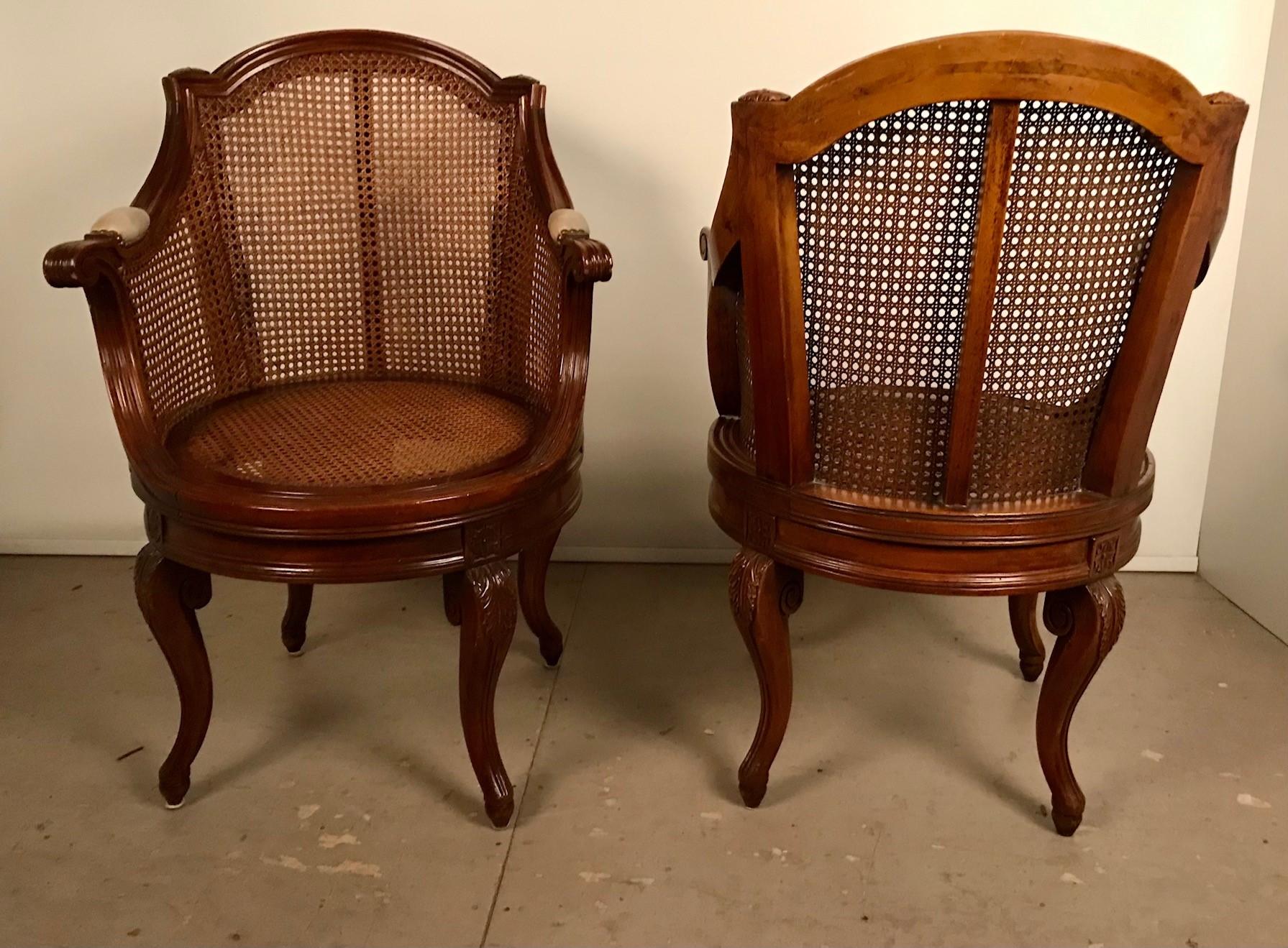 19th Century Pair of French Louis XV Style Walnut & Caned Swivel Armchairs For Sale