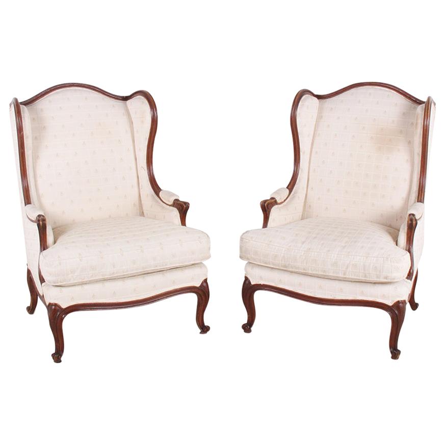 Pair of French Louis XV-Style Walnut Wingback Armchairs