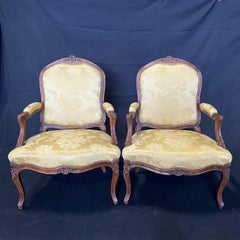 Pair of French Louis XV Walnut Carved Fauteuils or Arm Chairs