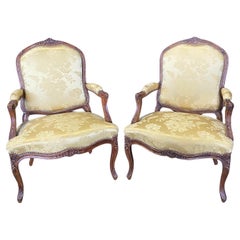 Pair of French Louis XV Walnut Carved Fauteuils or Arm Chairs 