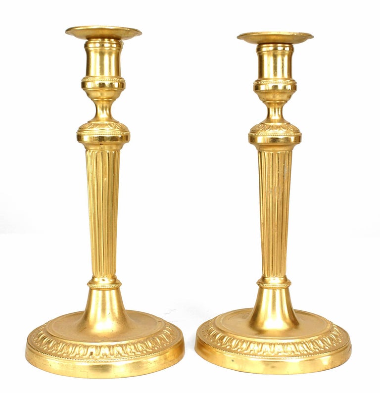 Louis XVI fluted candlesticks, 19th century, offered by Newel