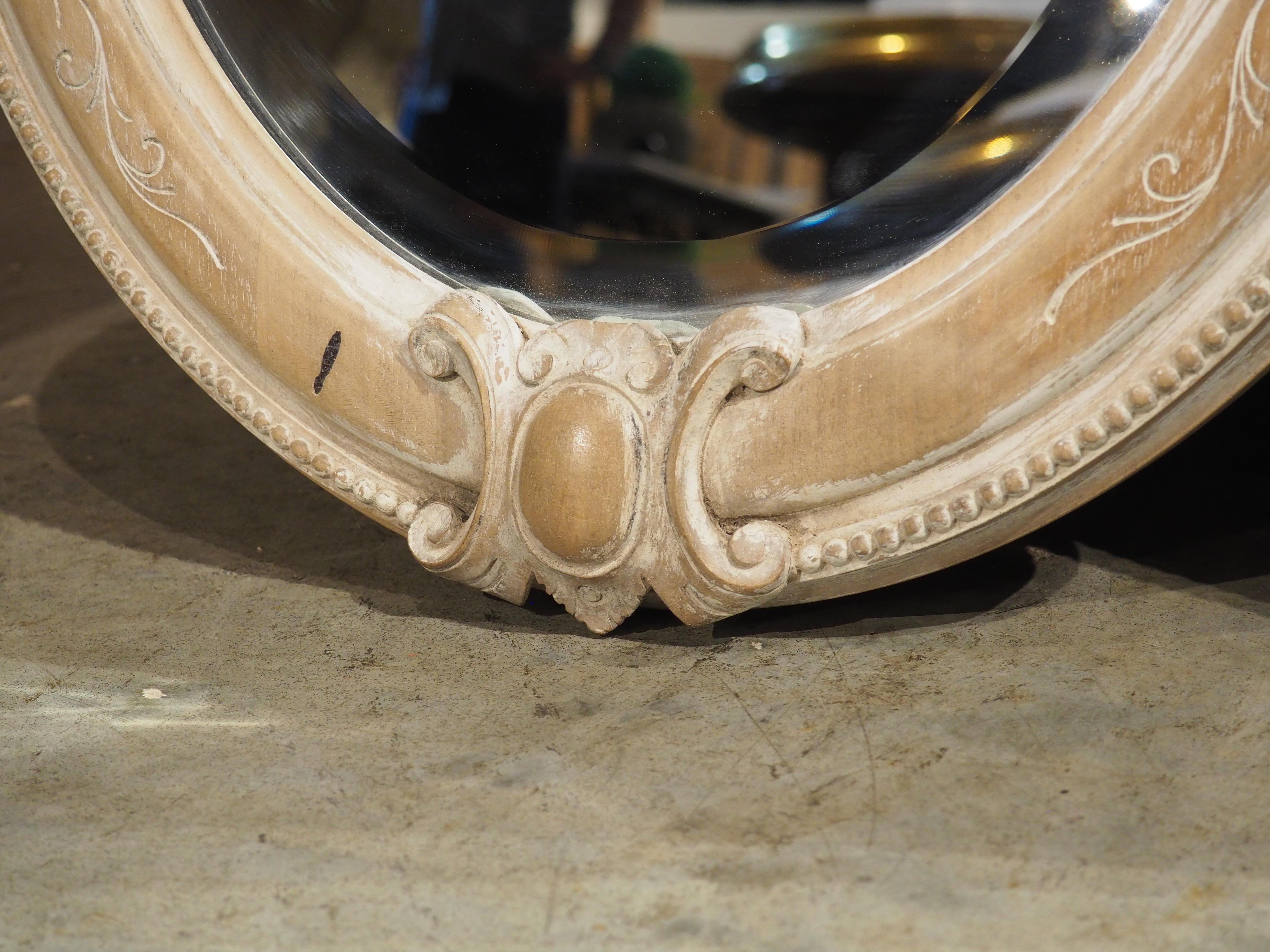 Pair of French Louis XVI Carved and Whitewashed Wooden Oval Mirrors, Early 1900s 7